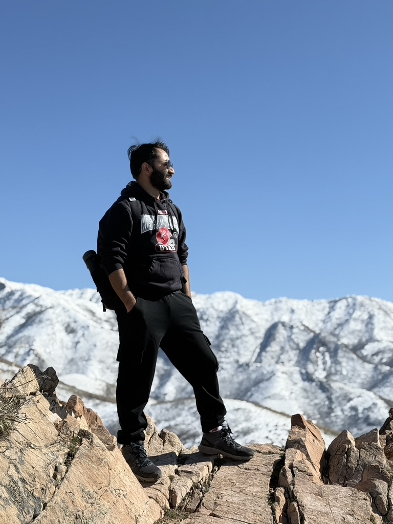 A photo of a person hiking in the mountains.